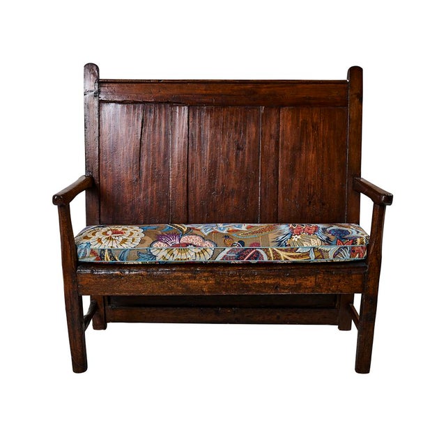 This 19th Century English wood bench includes a cushion made from Schumacher Zanzibar Linen Print fabric (173520).
