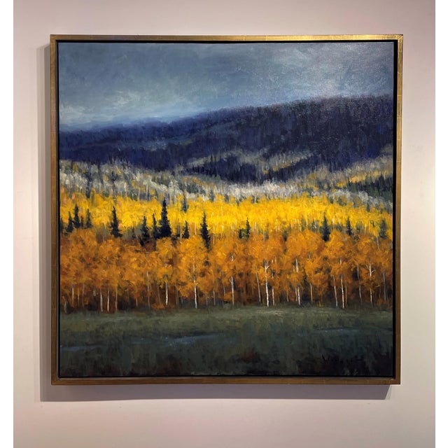 The artwork depicts a vibrant landscape where golden autumn foliage contrasts with the dark, moody mountains in the...