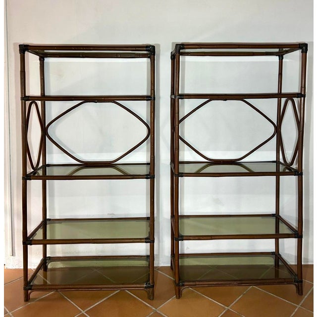 Beautiful pair of rattan shelves from the 1960s. The rattan is beautifully crafted, elegantly enhanced by shelves of...