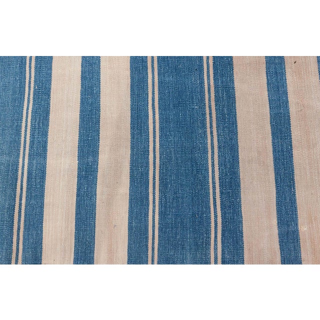 Vintage Indian Dhurrie Rug Size: 10'8" × 12'3" (325 × 373 cm) A striking example of minimalist elegance, this vintage...