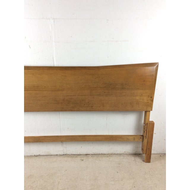 This mid century modern full size headboard by Heywood Wakefield features hardwood construction, original Sable finish,...