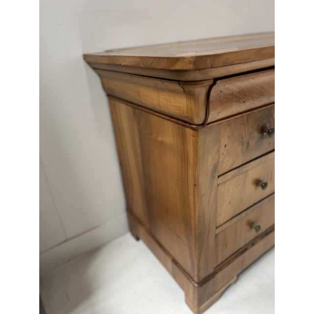 Louis Philippe chest of drawers in solid cherry wood Four drawers in the front The top is a wooden slab Good condition...