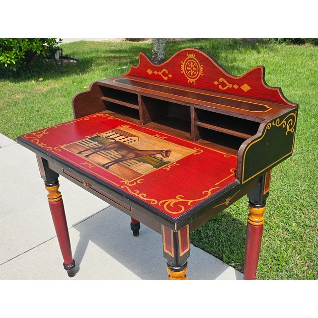 A charming and character-filled hand-painted secretary desk by Three Hands Corp., featuring a whimsical equestrian motif...