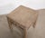 A beautifully proportioned vintage Chinese stool crafted from solid elmwood, dating to the first half of the 20th century....