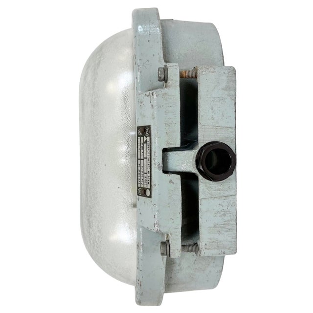 This industrial wall light was made by Elektrosvit in former Czechoslovakia during the 1970s. It features a cast aluminium...