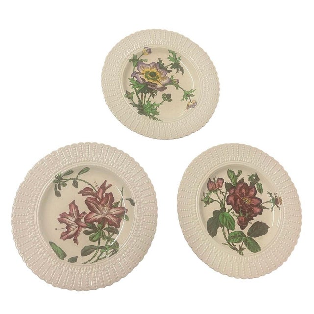 This exquisite set of twelve antique English fine porcelain salad or luncheon plates was produced by Cauldon Ltd. in...
