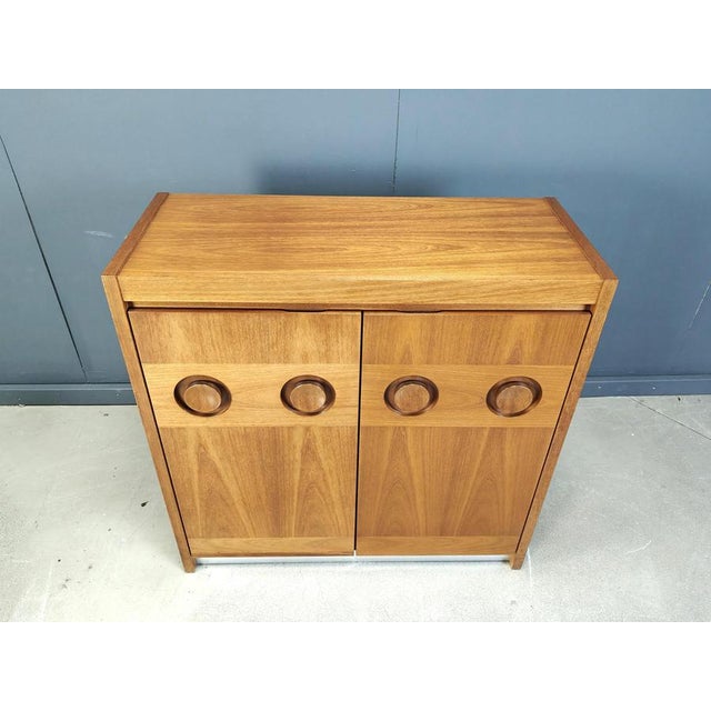 Stunning graphical design doors. Has 3 shelves and 3 drawers and a built in light. Eye catching and timeless piece. Very...