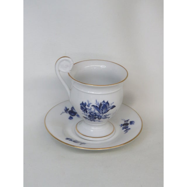 This lovely Richard Ginori cup and saucer set is made of Italian porcelain. This darling porcelain pair is white in color...