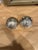This is a vintage silverplate wool holder. It was used to hold round wool balls for knitting. It is adorable.