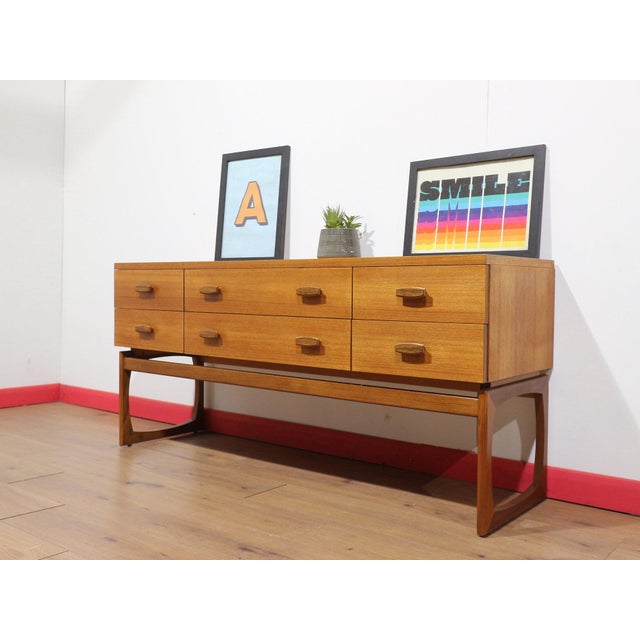 A beautiful dresser by G plan, this Mid Century Modern vintage teak piece showcases a beautiful grain that highlights its...