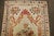 An early 20th-century Ivory field Turkish ghiordes small size rug. 3'6'' x 5'4''