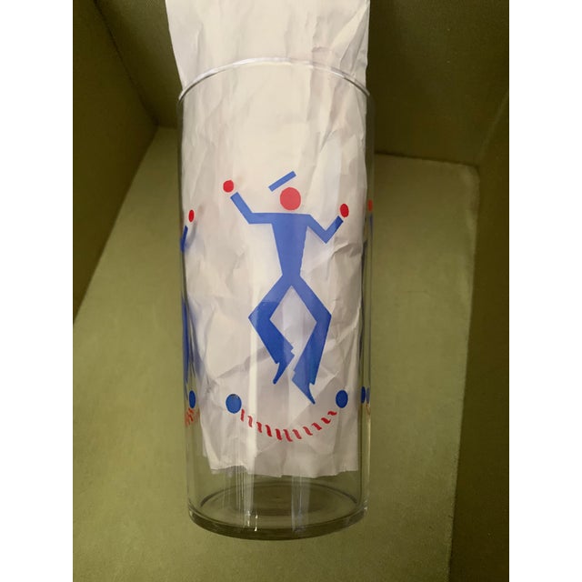 This is a vintage 1940s juice tumbler featuring a rare dancing sailor stick figure design, commonly referred to as a...
