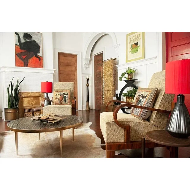 Pair of postmodern ceramic table lamps from the 1980s. They feature fluted ceramic bases with a dense, sculptural form,...