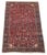 A lovely antique Ferahan rug, woven circa 1910. This rug features an all over geometrical design of stylised flowers and...