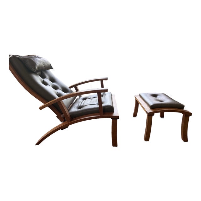Thos. Moser “Lolling Chair” and Ottoman in Cherry and Dark Leather For Sale
