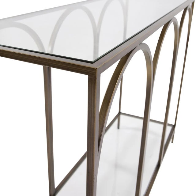 The arched windows of the early 18th century inspired the Palladio Console Table. The hand rubbed bronze finish not only...