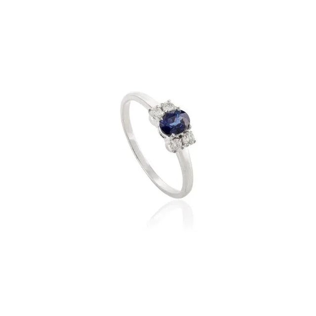 This is part of Chairish’s Fine Jewelry assortment. 0.49 Carat Blue Sapphire and Diamond Everyday Ring in 14K Gold...
