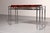 Refined and elegant console in chrome and wood, one of a kind design; chrome and wood design go perfectly together. This...