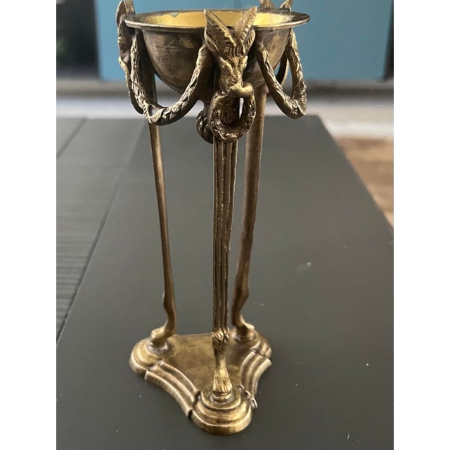 This incense burner candle holder consists of a Decorated Small Brass Bowl supported by three detailed Rams Heads which...