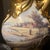 Rococo porcelain, popular in 18th-century Europe, is characterized by its elaborate ornamentation, asymmetrical designs,...