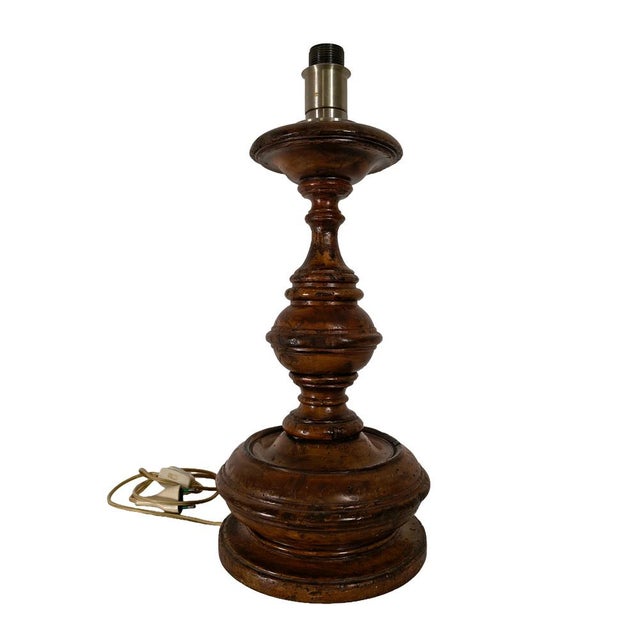 An impressive table lamp created from an antique solid turned wood base, most likely dating to the 19th century and later...
