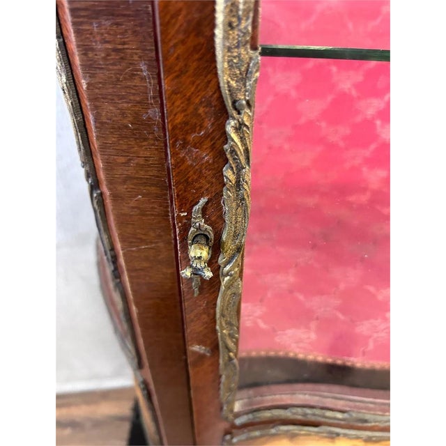 Gorgeous Cabinet in Good Vintage Condition. Solid and Firm. Pleast note that the Windows are made from Plastic. There is...