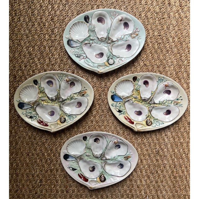 Hand painted oyster plate made in the United States by Union Porcelain Works in the late 19th century. Decorated with sea...