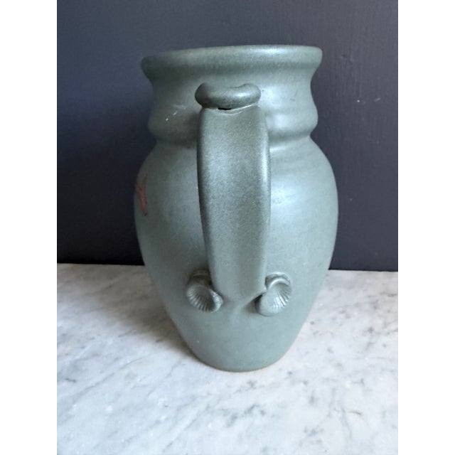 Handmade studio pottery pitcher by Yvonne Lynch, Nova Scotia, Canada. Beautiful blue gray glaze with abstract design on...