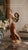 Elegant vintage figurine depicting a graceful tambourine dancer in flowing garments with beautiful hand-painted details...