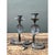 This pair of candle holders takes the dramatic form of rearing cobras, their coiled bodies forming sinuous, serpentine...