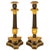 PAIR OF GILT AND PATINATED CHARLES X CANDLESTICKS Raised on animal paws | circa first half of the 19th century ref....