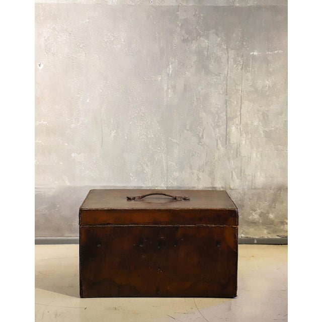 Louis Vuitton trunk in original 1910 leather Very rare piece. Complete with details, red straps with Louis Vuitton...