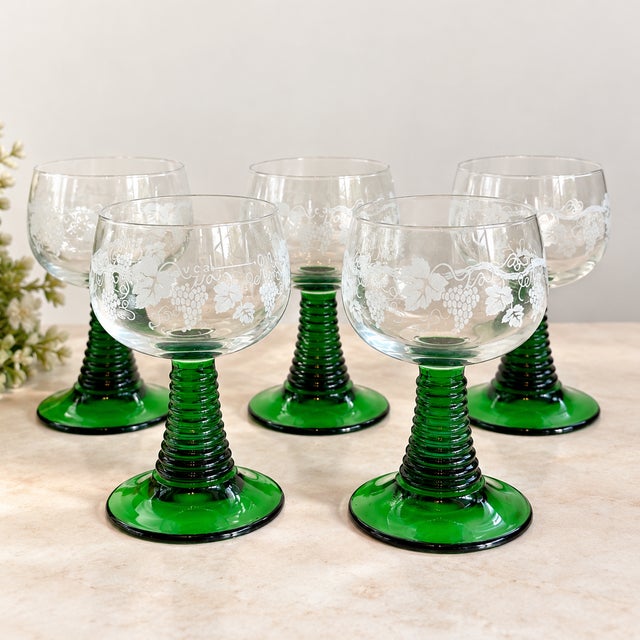 A charming set of five vintage Roemer wine glasses, attributed to French glassmaker Luminarc. Each features a rounded...