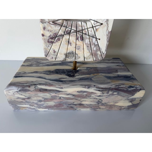 Striking 1980’s Italian Postmodern abstract sculpture crafted from richly veined Calacatta Viola marble. This sculptural...