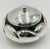 A striking vintage Los Castillo lidded bowl from Taxco, Mexico, combining sculptural Mexican metalwork with richly colored...