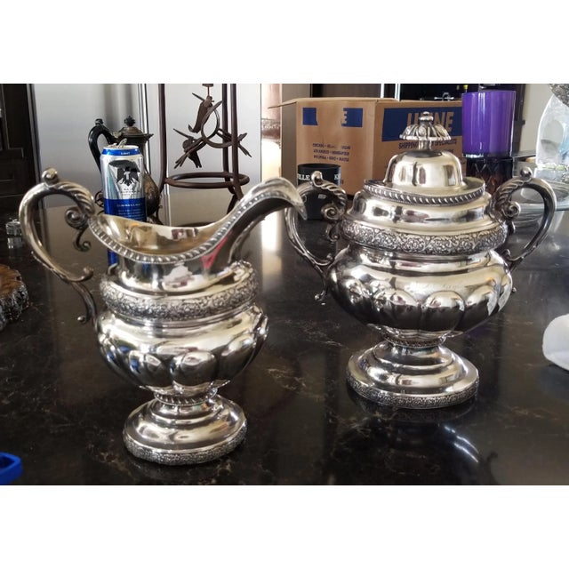 Beautiful mid 19th century coin silver pitcher and sugar .....American. "Taylor" engraved on each piece with an initial...