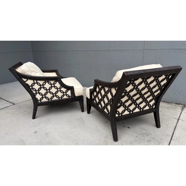 I have found variations of these chairs attributed to Lexington and Tommy Bahama. However these are perhaps an older...