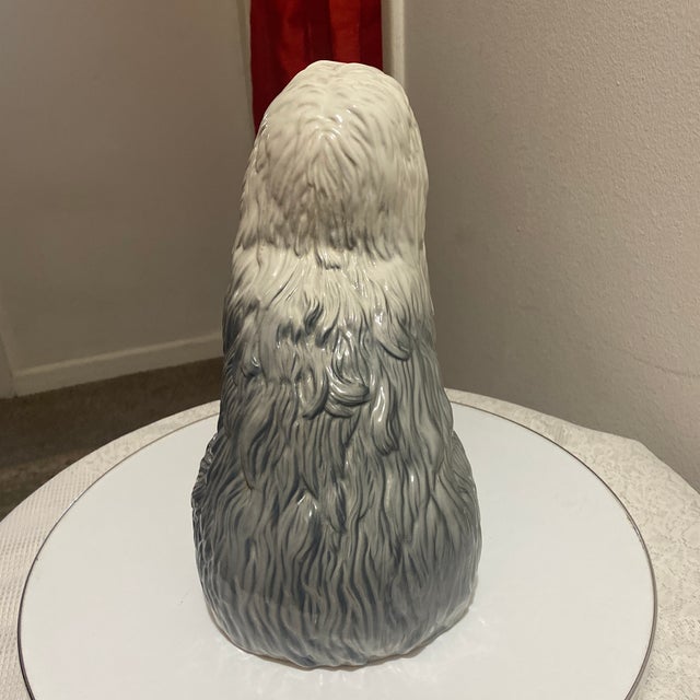 This is a large vintage Beswick Old English Sheepdog ceramic figurine. Also known as the “fireside model”.