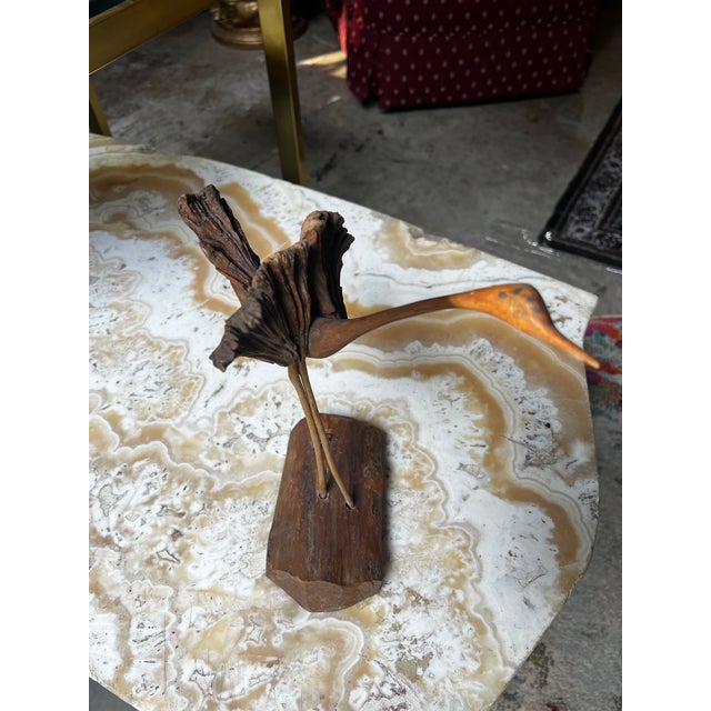 Up for consideration is a beautiful vintage handmade driftwood bird sculpture. This would look lovely in your home, and it...