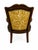 A vintage mid-century modern cane armchair, likely manufactured in the 1960s or 1970s. It features a dark-stained carved...