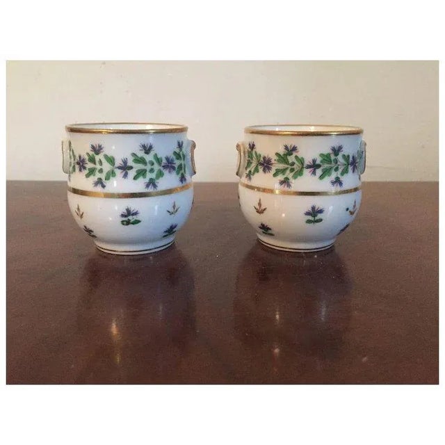 Pair antique late 18th / early 19th century French Empire Old Paris porcelain pot de creme urns in the sprig or cornflower...