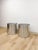 This striking pair of vintage round chrome oversized planters are a bold and glamorous mid-century modern decorative find....