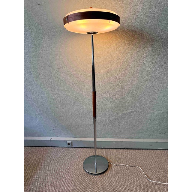 This is one of the rarest and most visually distinctive floor lamps ever produced by fase: the eclipse s model, patented...