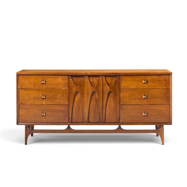 Broyhill Brasilia Mid Century Walnut and Brass Lowboy Dresser This lowboy measures: 66 wide x 19 deep x 30.75 inches high...
