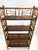 This is an early 20th century handcrafted bamboo and oak etagere. This etagere features delicate handcrafted bamboo...