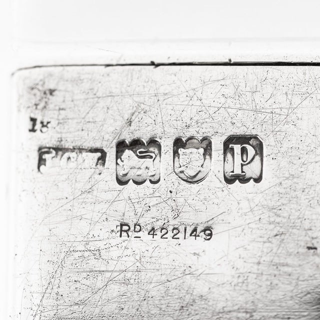 Antique early-20th century british solid silver weighted ruler, with engraved inches and centimeter markings. Mounted on...