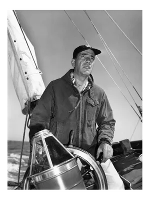 Humphrey Bogart at the Helm 1952, Photo by Sid Avery
