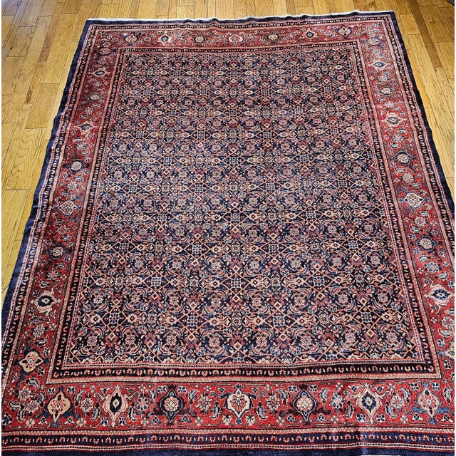 This exquisite vintage Persian Mahal Sultanabad rug dates from the second quarter of the 20th century and showcases a...