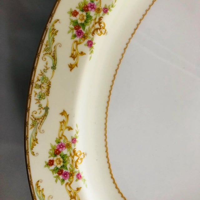 Vintage fine porcelain floral design oval serving platter, 16.25" L 12.15"W X 1.50 H, Makers mark reads " Noritake M Japan...