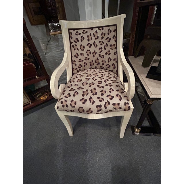 Glamorous cream tessellated bone armchair having curlicue arms and sensational new Scalamandre animal print upholstery....